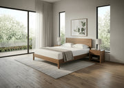 Wooden bed with white bedding in a bedroom setting